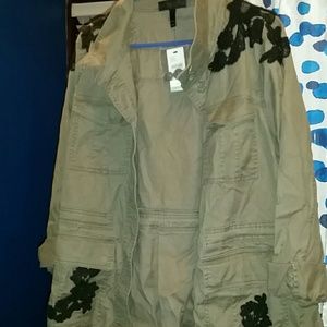 Very cool khaki and black design jacket ! Vintage looking!